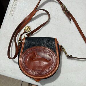 The DOONEY & BOURKE All Weather Leather Air Force Blue Duck Crossbody Handbag